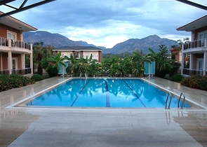 Квартиры 2+1 с мебелью 200 м до моря в Чамьюва Кемере