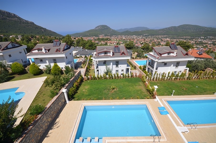 Вилла с четырьмя спальнями в районе Оваджик, Фетхие