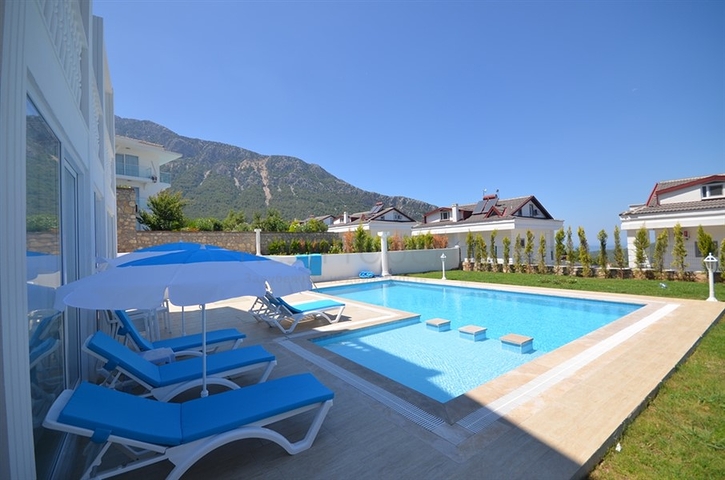 Вилла с четырьмя спальнями в районе Оваджик, Фетхие