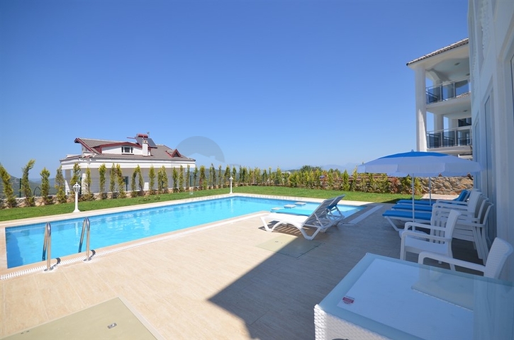 Вилла с четырьмя спальнями в районе Оваджик, Фетхие