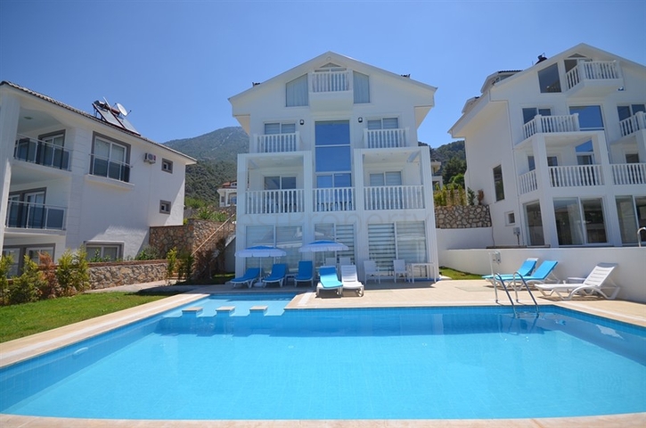 Вилла с четырьмя спальнями в районе Оваджик, Фетхие