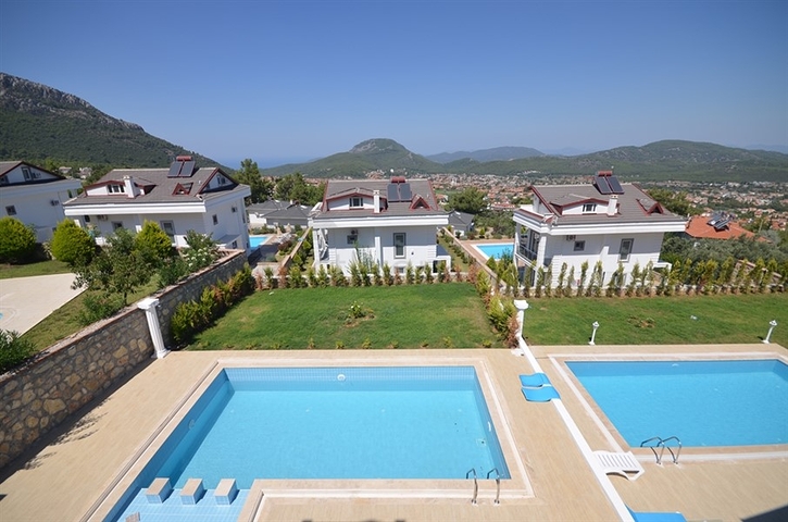 Вилла с четырьмя спальнями в районе Оваджик, Фетхие