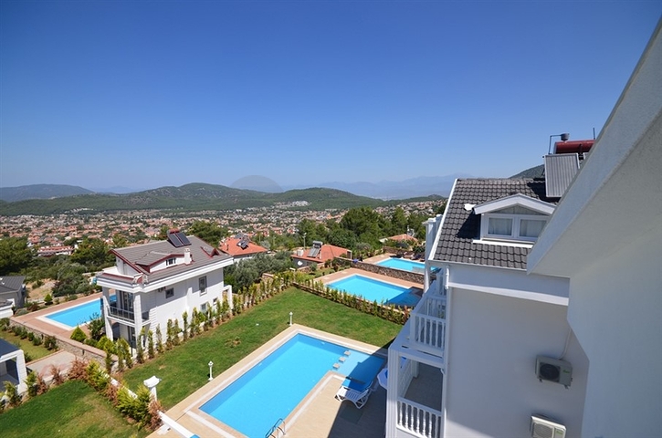 Вилла с четырьмя спальнями в районе Оваджик, Фетхие