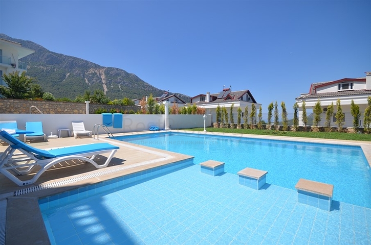 Вилла с четырьмя спальнями в районе Оваджик, Фетхие