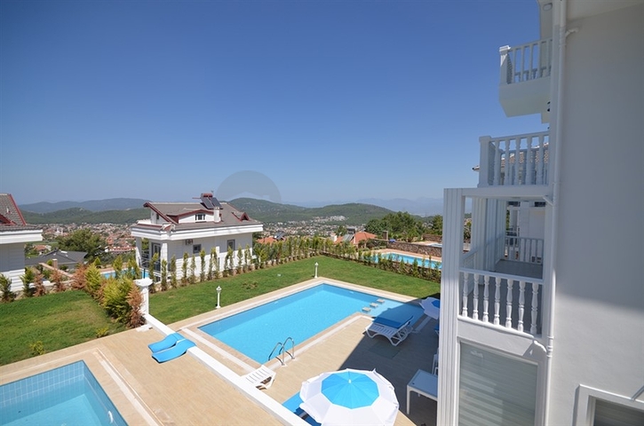 Вилла с четырьмя спальнями в районе Оваджик, Фетхие