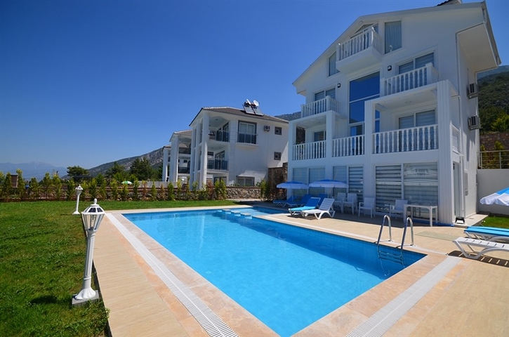 Вилла с четырьмя спальнями в районе Оваджик, Фетхие