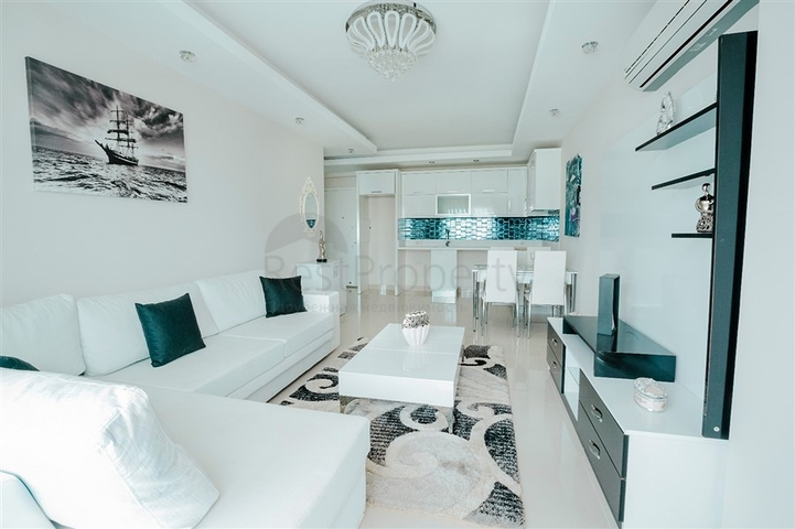 Просторная двухкомнатная квартира в районе Махмутлар