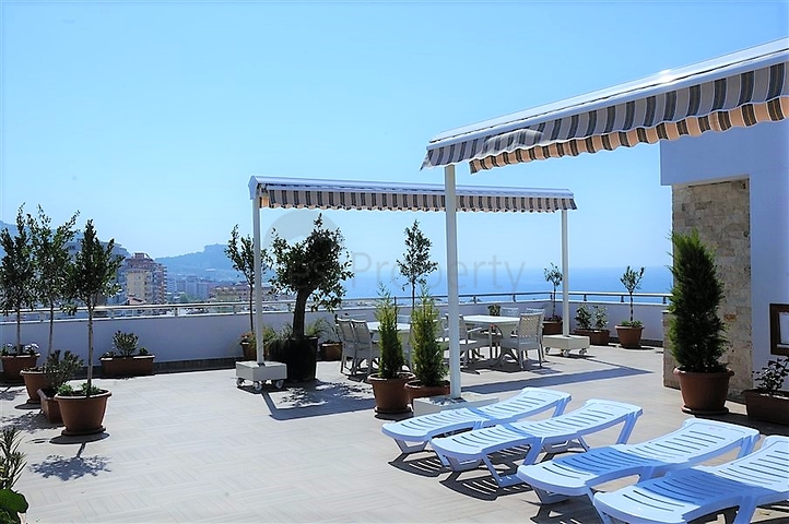 Просторная двухкомнатная квартира в районе Махмутлар