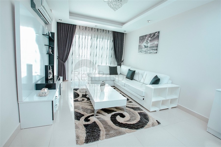 Просторная двухкомнатная квартира в районе Махмутлар