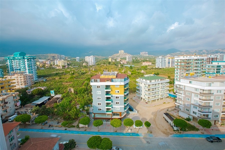 Просторная двухкомнатная квартира в районе Махмутлар