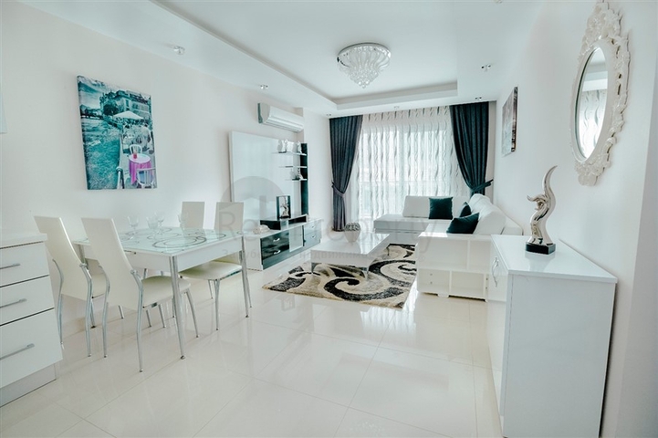 Просторная двухкомнатная квартира в районе Махмутлар