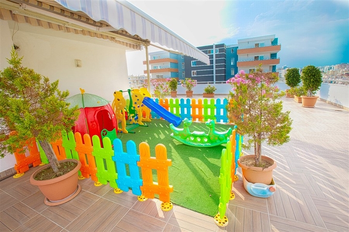 Просторная двухкомнатная квартира в районе Махмутлар