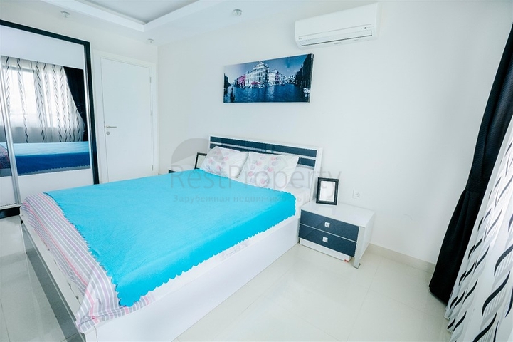 Просторная двухкомнатная квартира в районе Махмутлар