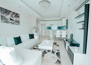 Просторная двухкомнатная квартира в районе Махмутлар