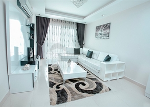 Просторная двухкомнатная квартира в районе Махмутлар