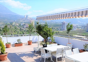 Просторная двухкомнатная квартира в районе Махмутлар