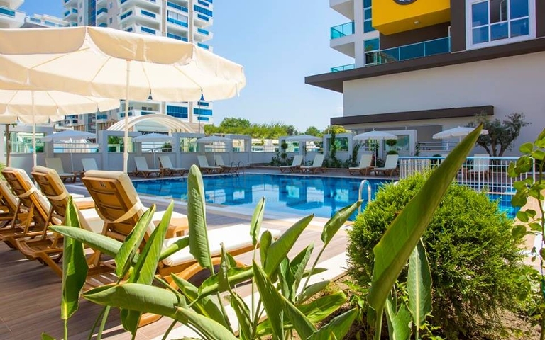 Уютная квартира 1+1 в современном комплексе в Махмутларе