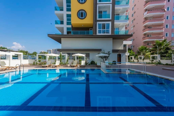 Уютная квартира 1+1 в современном комплексе в Махмутларе