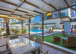 Уютная квартира 1+1 в современном комплексе в Махмутларе