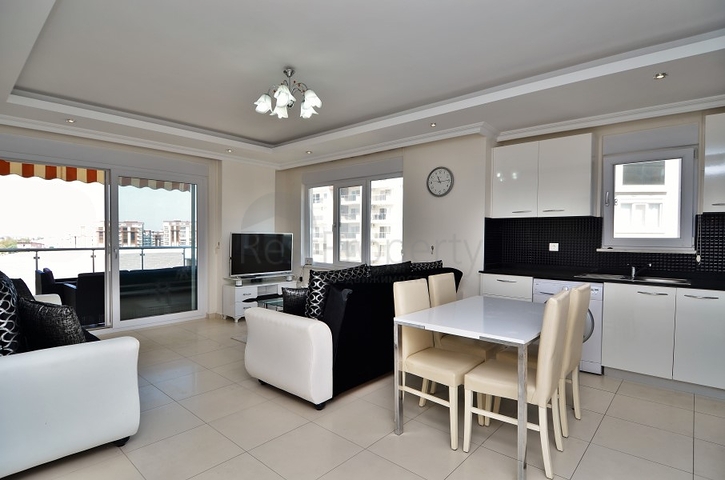 Трехкомнатная квартира с собственным пляжем в Авсалларе