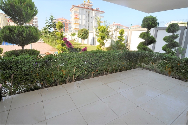 Просторный дуплекс с выходом в сад