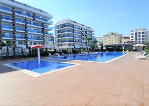 Просторный дуплекс с выходом в сад