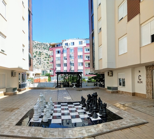 Квартира 1+1 с видом на бассейн в Хурме Коньяалты