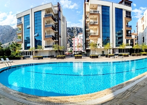 Квартира 1+1 с видом на бассейн в Хурме Коньяалты
