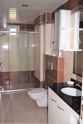 Апартаменты 1+1 в тихом и зеленом уголке Алании