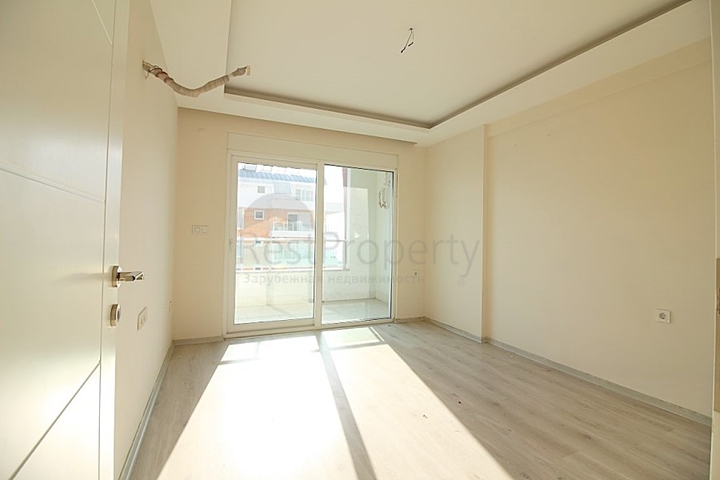 Двухкомнатная квартира в районе Махмутлар