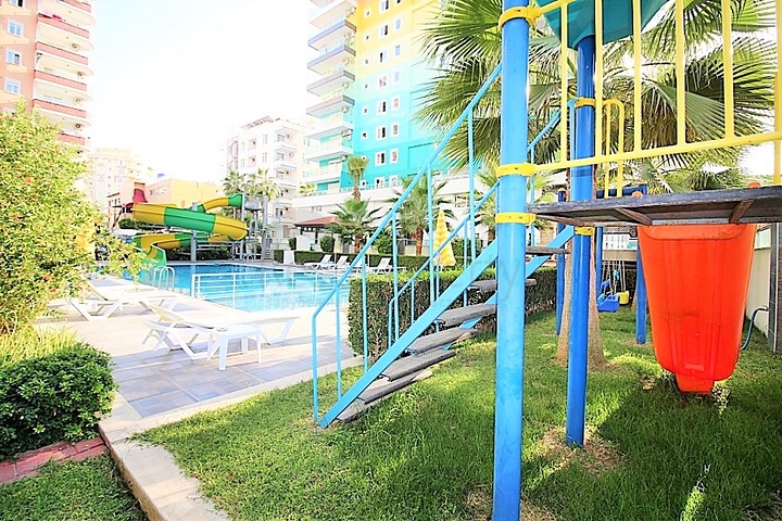 Двухкомнатная квартира в районе Махмутлар