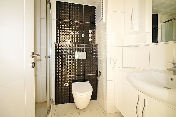 Двухкомнатная квартира в районе Махмутлар