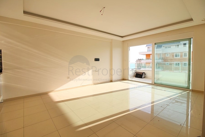 Двухкомнатная квартира в районе Махмутлар