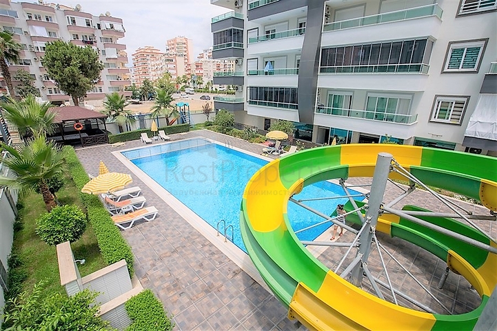 Двухкомнатная квартира в районе Махмутлар