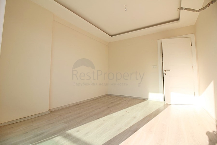 Двухкомнатная квартира в районе Махмутлар