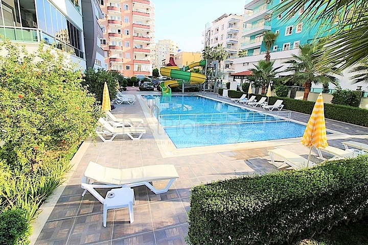 Двухкомнатная квартира в районе Махмутлар