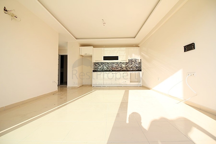 Двухкомнатная квартира в районе Махмутлар