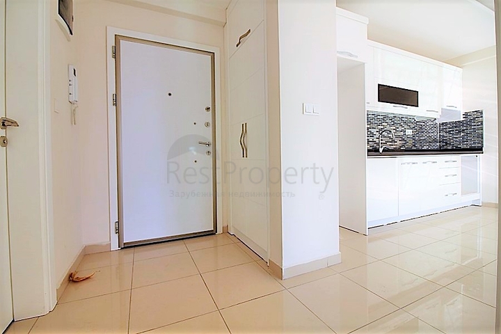 Двухкомнатная квартира в районе Махмутлар