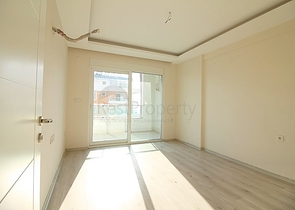 Двухкомнатная квартира в районе Махмутлар