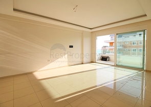 Двухкомнатная квартира в районе Махмутлар