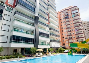 Двухкомнатная квартира в районе Махмутлар