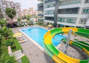 Двухкомнатная квартира в районе Махмутлар