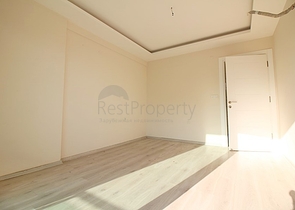 Двухкомнатная квартира в районе Махмутлар