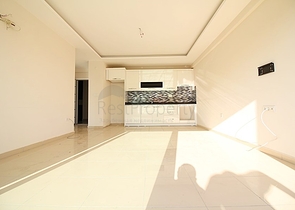 Двухкомнатная квартира в районе Махмутлар