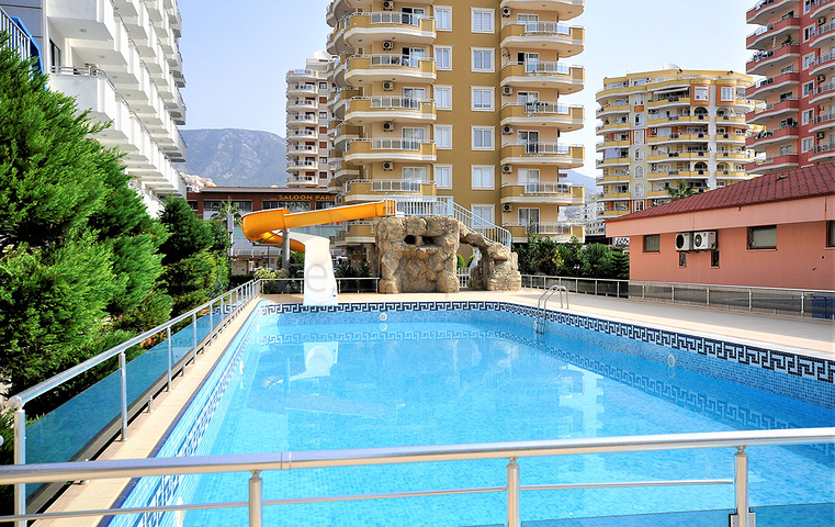 Меблированная квартира 2+1 с отдельной кухней через дорогу от пляжа