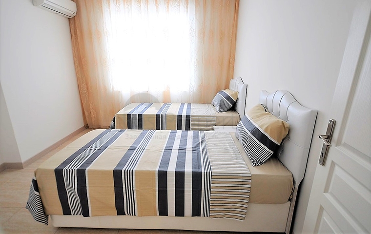 Меблированная квартира 2+1 с отдельной кухней через дорогу от пляжа