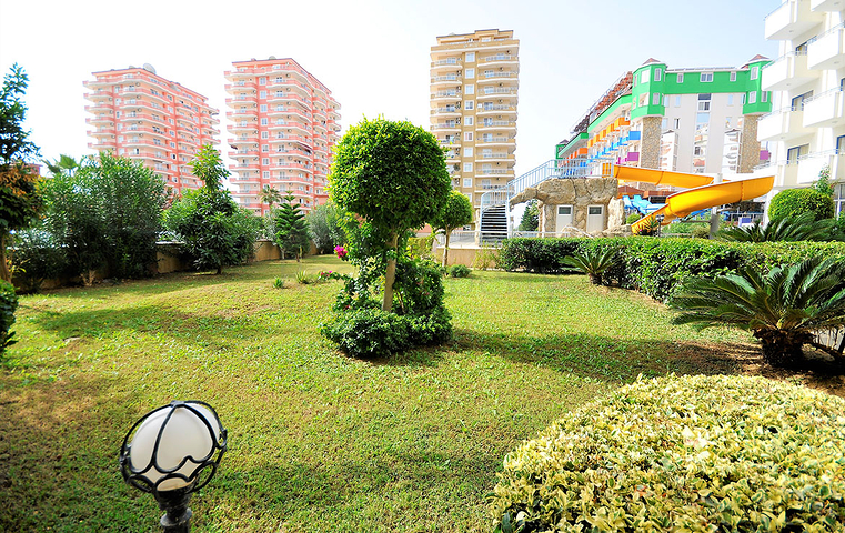 Меблированная квартира 2+1 с отдельной кухней через дорогу от пляжа