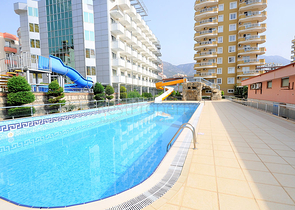 Меблированная квартира 2+1 с отдельной кухней через дорогу от пляжа