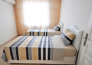 Меблированная квартира 2+1 с отдельной кухней через дорогу от пляжа