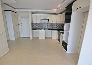 Апартаменты с планировкой 1+1